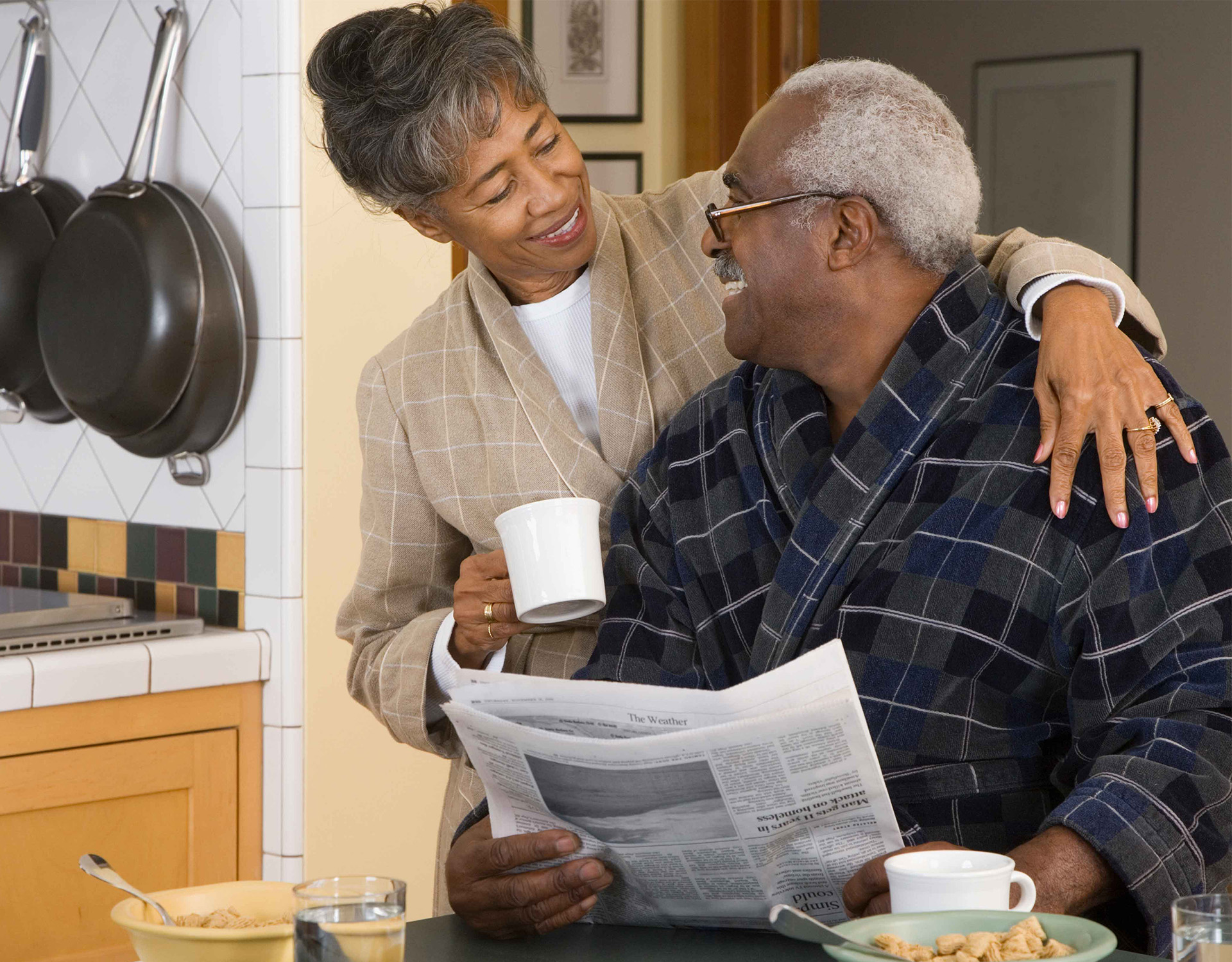 Couple chatting over a cup of coffee.