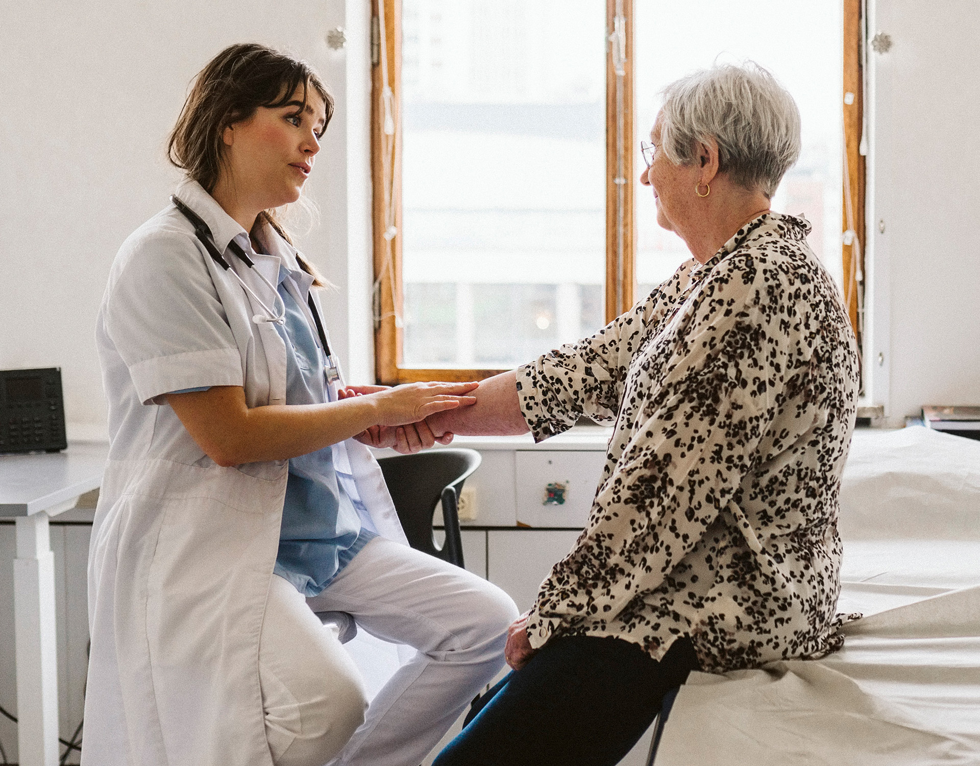 Clinician evaluating a patient. 