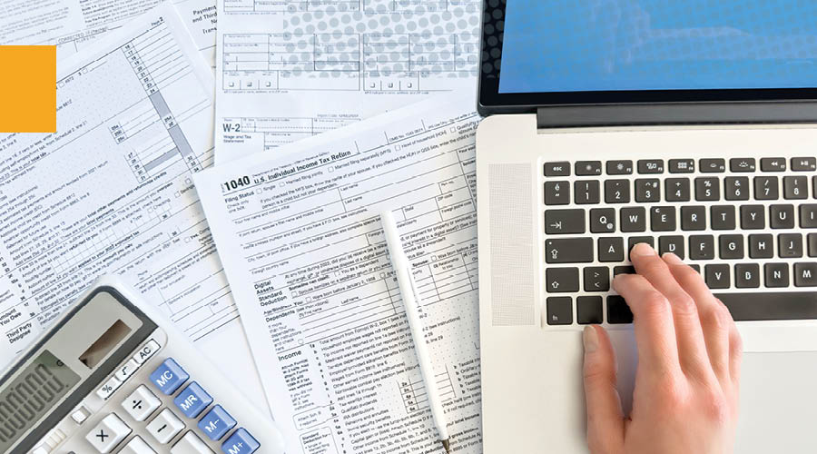 person working on tax documents